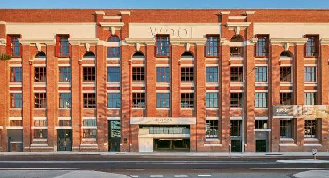 Front facade of heritage building Heirloom Apartments by Match which was restored Dalgety Wools Store into loft apartments in Fremantle