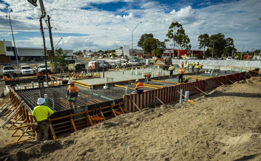 Snapshot of construction workers at the Quest Apartment Hotel in Ascot, taken in May 2019 showcasing 500m3 of cement being poured